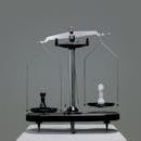 Chess pieces balanced on a scale depicting equality or strategy in decision making.